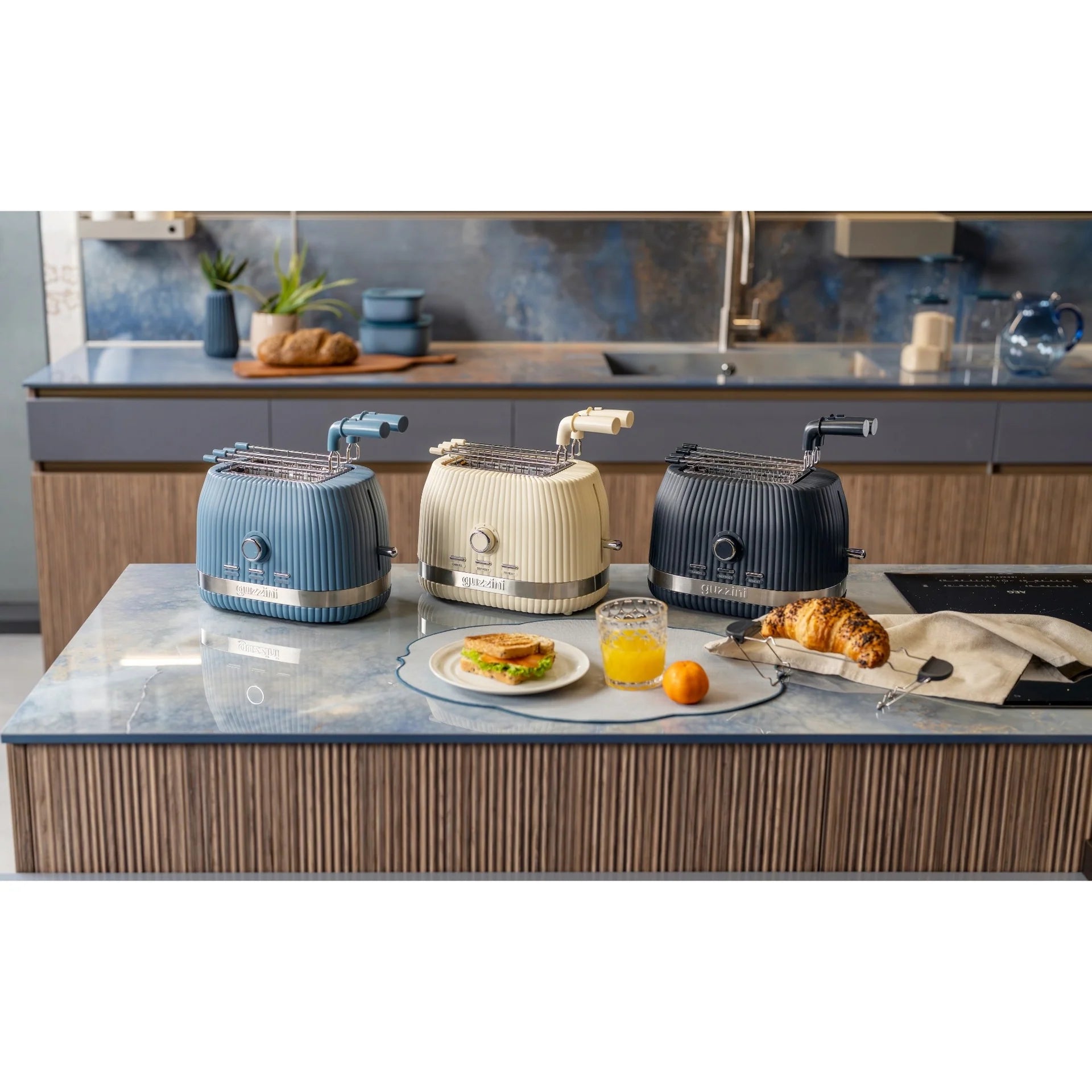 Guzzini - Tosatapane con pinze Sous Chef crema | Rohome