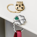 Thun - Gancio portaborsa in metallo coccinella gold | Rohome