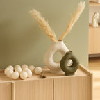 Vaso in ceramica moderno forma scultorea verde | Rohome