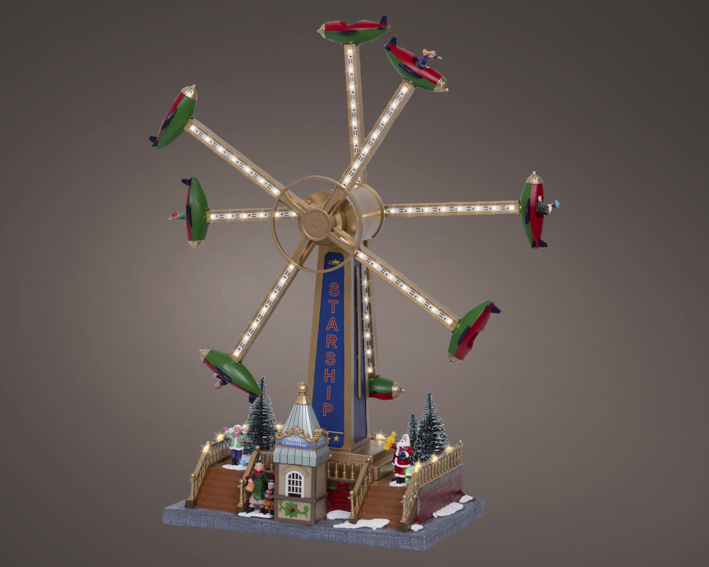 Scenografia villaggio di natale giostra Starship | rohome