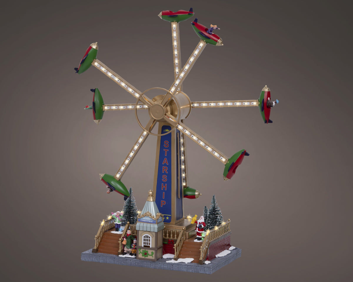 Scenografia villaggio di natale giostra Starship | rohome