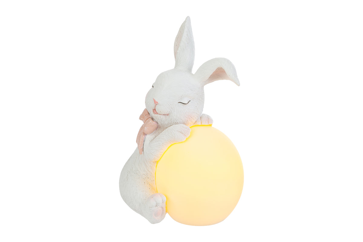 Coniglio pasquale in resina con uovo led h.15cm | Rohome
