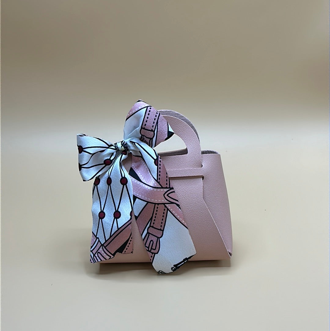 Bomboniera - borsetta rosa con fiocco in tessuto | rohome
