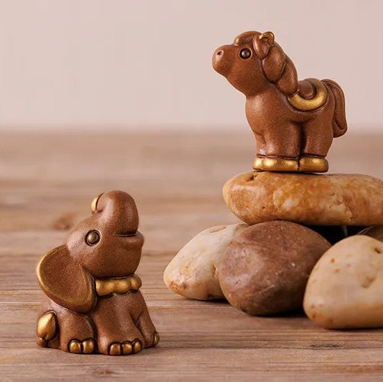 Elefante marrone 100 anniversario | Rohome
