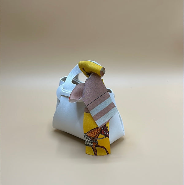 Bomboniera - borsetta avorio con fiocco in tessuto | rohome
