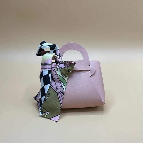 Bomboniera - borsetta rosa con fiocco in tessuto | rohome