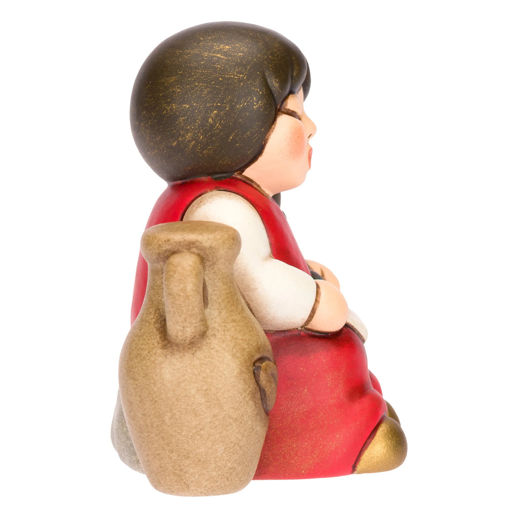 Thun - Bimba con olive in ceramica Presepe Classico rosso | Rohome
