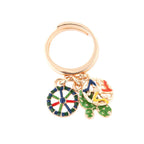Anello in metallo oro con charm ruota e fico d'india | Rohome - Rohome