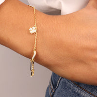 Bracciale in argento oro con ciondoli portafortuna e zirconi | Rohome