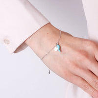 Bracciale in argento con ciondolo corno portafortuna azzurro | Rohome