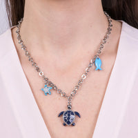 Collana in metallo con pendente tartaruga blu | Rohome