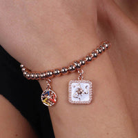 Bracciale in Metallo con pendente a quadrata con trinacria | Rohome
