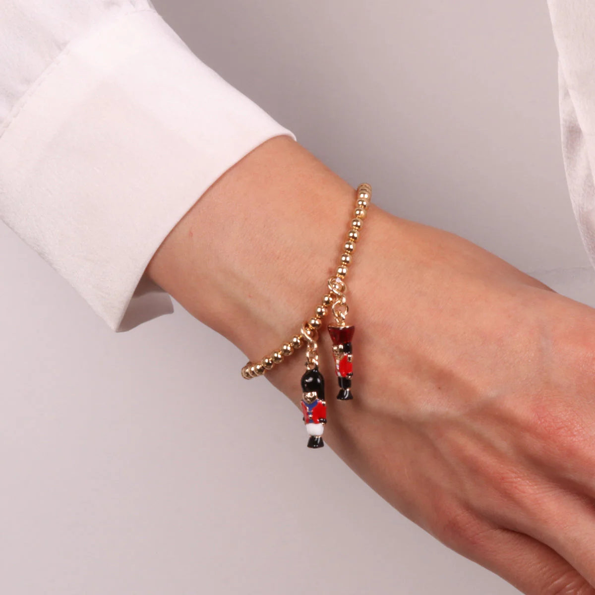 Bracciale in Metallo con schiaccianoci pendenti | Rohome