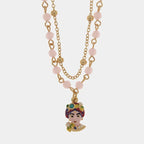 Collana in metallo con testa di moro e perle rosa | Rohome | Rohome