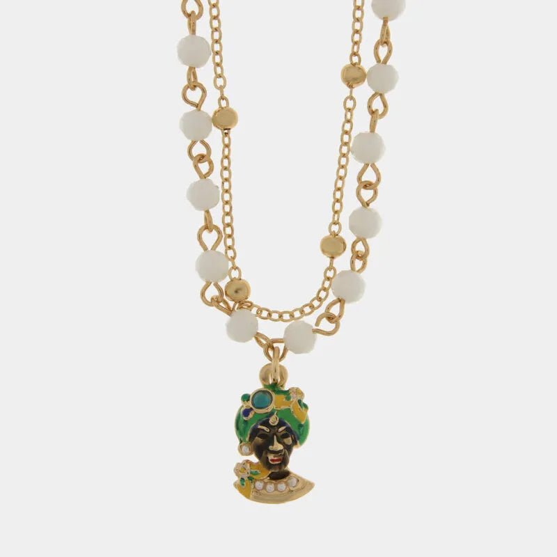 Collana in metallo con testa di moro verde e perle bianche | Rohome | Rohome